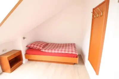 Ein Bett oder Betten in einem Zimmer der Unterkunft Haus Itjen Blau 4