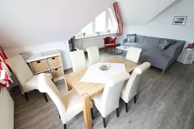 Ein Sitzbereich in der Unterkunft Haus Itjen Rot 3