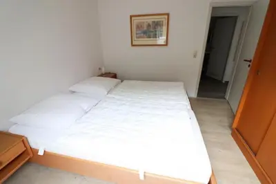 Ein Bett oder Betten in einem Zimmer der Unterkunft Haus Itjen Rot 3