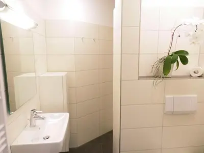 Ein Badezimmer in der Unterkunft Haus Itjen Gelb 2