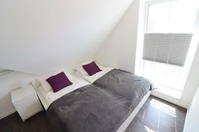 Ein Bett oder Betten in einem Zimmer der Unterkunft Ferienhaus im Angerdorf