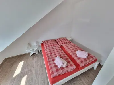 Ein Bett oder Betten in einem Zimmer der Unterkunft Haus Itjen 5 Watt'nblick
