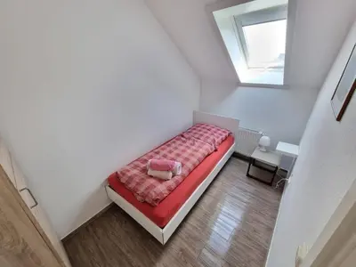 Ein Bett oder Betten in einem Zimmer der Unterkunft Haus Itjen 5 Watt'nblick