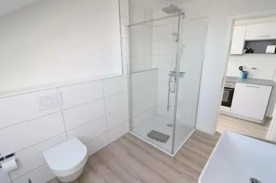 Ein Badezimmer in der Unterkunft Meerhaus 1 OG