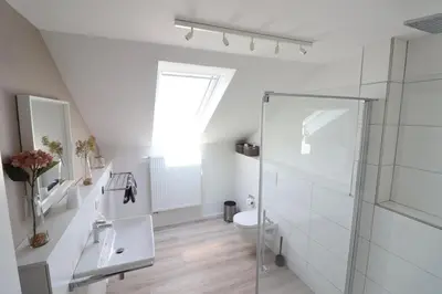 Ein Badezimmer in der Unterkunft Meerhaus 1 OG