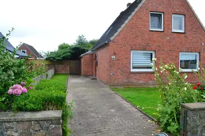 Ein Garten an der Unterkunft Nordseeidylle II