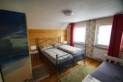 Ein Bett oder Betten in einem Zimmer der Unterkunft Nordseeidylle II