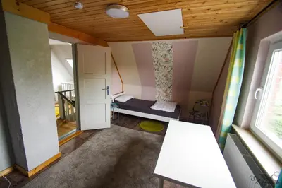 Ein Bett oder Betten in einem Zimmer der Unterkunft Nordseeidylle II