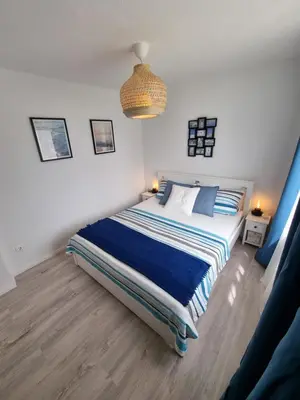 Ein Bett oder Betten in einem Zimmer der Unterkunft Ferienwohnung Elwetritsch an der Nordsee