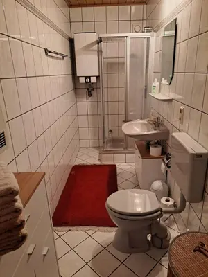 Ein Badezimmer in der Unterkunft Ferienwohnung Lefering Stiftung