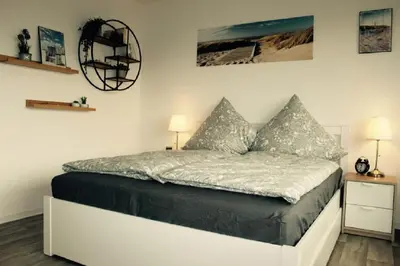 Ein Bett oder Betten in einem Zimmer der Unterkunft Jan am Strand 315
