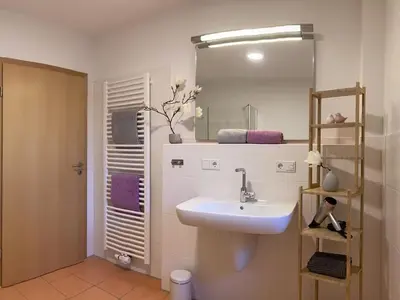 Ein Badezimmer in der Unterkunft Ferienhaus Große Freiheit