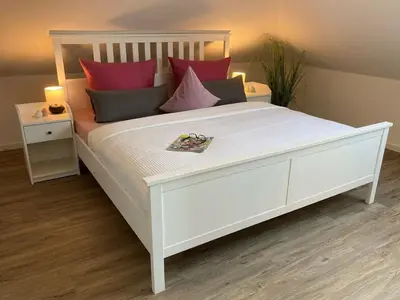 Ein Bett oder Betten in einem Zimmer der Unterkunft Ferienhaus Große Freiheit