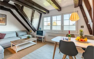 Ein Sitzbereich in der Unterkunft Cozy Apartment In Friedrichskoog-Spitze