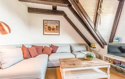 Ein Sitzbereich in der Unterkunft Cozy Apartment In Friedrichskoog-Spitze