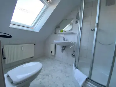 Ein Badezimmer in der Unterkunft Duhner Brise, Ferienwohnung 5