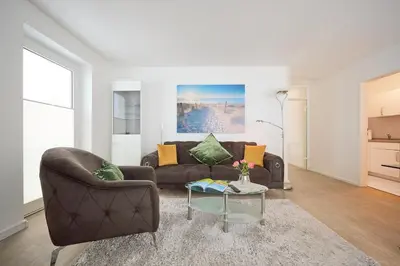 Ein Sitzbereich in der Unterkunft Haus an der Düne Ferienwohnung 5