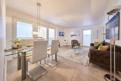 Ein Sitzbereich in der Unterkunft Haus an der Düne Ferienwohnung 5