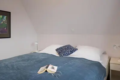 Ein Bett oder Betten in einem Zimmer der Unterkunft Am Ringwall 1 A