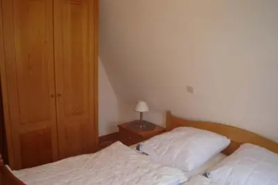 Ein Bett oder Betten in einem Zimmer der Unterkunft Kampweg 18