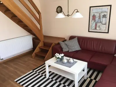 Ein Sitzbereich in der Unterkunft Kampweg 18