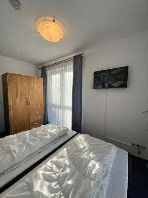 Ein Bett oder Betten in einem Zimmer der Unterkunft Voßhörn 19