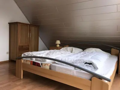 Ein Bett oder Betten in einem Zimmer der Unterkunft Voßhörn 19