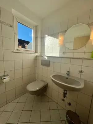 Ein Badezimmer in der Unterkunft Voßhörn 19 a