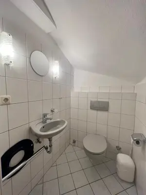 Ein Badezimmer in der Unterkunft Voßhörn 19 a