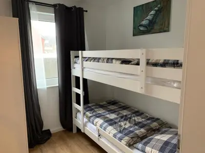 Ein Bett oder Betten in einem Zimmer der Unterkunft Residenz 32 Wohnung 4