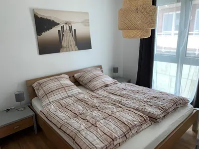 Ein Bett oder Betten in einem Zimmer der Unterkunft Residenz 32 Wohnung 4
