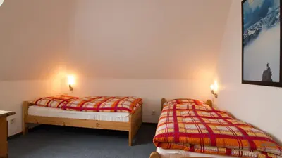 Ein Bett oder Betten in einem Zimmer der Unterkunft Haus Kerstin Duhnen Wohnung 9