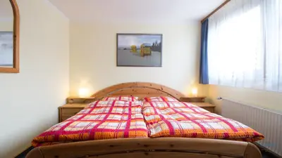 Ein Bett oder Betten in einem Zimmer der Unterkunft Haus Kerstin Duhnen Wohnung 9