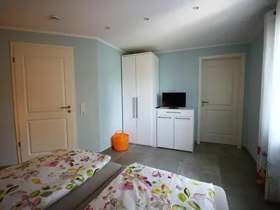 Ein Bett oder Betten in einem Zimmer der Unterkunft Ferienhaus Küstenhaus Wremen