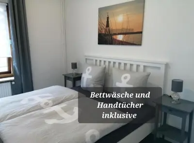 Ein Bett oder Betten in einem Zimmer der Unterkunft Steinmarner Bude 3