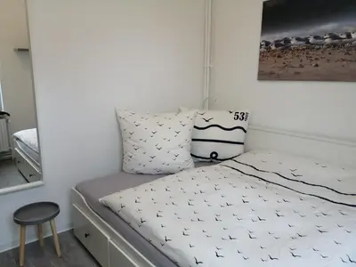 Ein Bett oder Betten in einem Zimmer der Unterkunft Steinmarner Bude 3