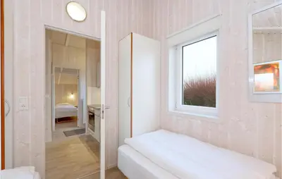 Ein Bett oder Betten in einem Zimmer der Unterkunft Friedrichskoog-Strandpark 9