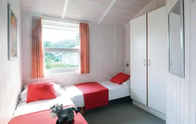 Ein Bett oder Betten in einem Zimmer der Unterkunft Friedrichskoog-Strandpark 3
