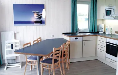 Küche/Küchenzeile in der Unterkunft Friedrichskoog-Deichblick 10