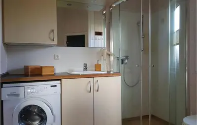 Ein Badezimmer in der Unterkunft Friedrichskoog-Deichblick 14