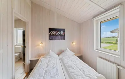 Ein Bett oder Betten in einem Zimmer der Unterkunft Friedrichskoog-Deichblick 20