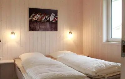 Ein Bett oder Betten in einem Zimmer der Unterkunft Friedrichskoog-Deichblick 7