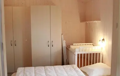 Ein Bett oder Betten in einem Zimmer der Unterkunft Friedrichskoog-Deichblick 8