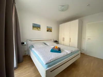 Ein Bett oder Betten in einem Zimmer der Unterkunft Oasis 10