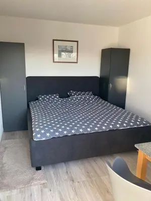 Ein Bett oder Betten in einem Zimmer der Unterkunft Oasis 08