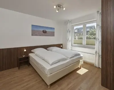 Ein Bett oder Betten in einem Zimmer der Unterkunft Op de Geest 03