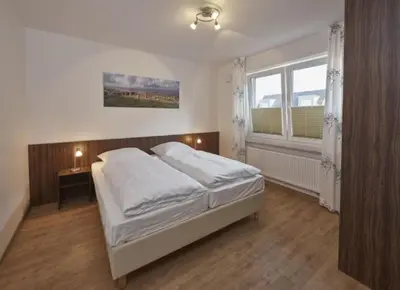 Ein Bett oder Betten in einem Zimmer der Unterkunft Op de Geest 09
