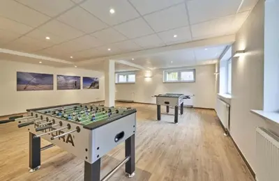 Eine Spielezimmer in der Unterkunft Op de Geest 14