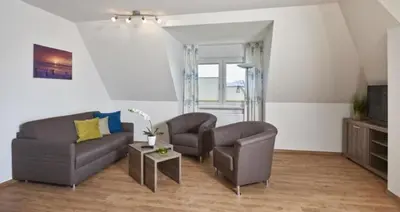 Ein Sitzbereich in der Unterkunft Op de Geest 15