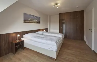 Ein Bett oder Betten in einem Zimmer der Unterkunft Op de Geest 16